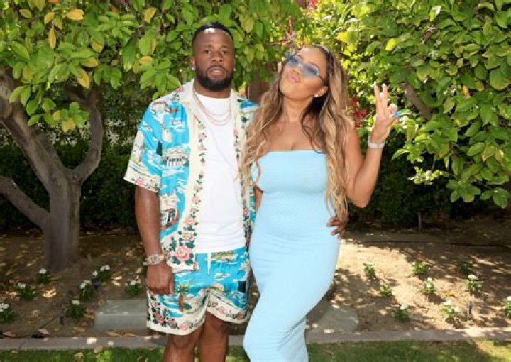 ANGELA SIMMONS POSES IN SWEET PHOTO WITH YO GOTTI AND HER SON