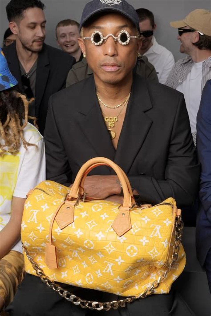 Pharell Flaunts Louis Vuitton ‘Millionaire’ Bag in Paris Fashion Week